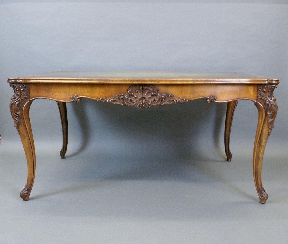 A large 19thC French walnut writing table View V