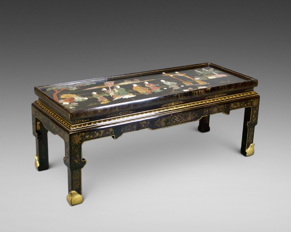 A black Jappaned chioniserie coffee table
