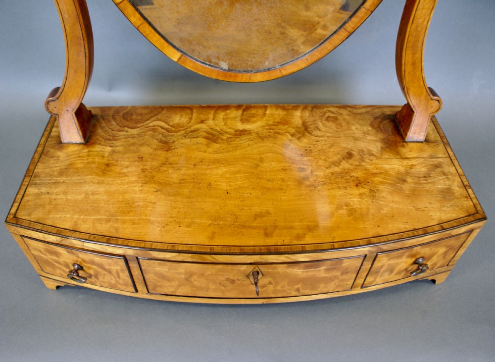 A Regency satinwood toilet mirror View IV
