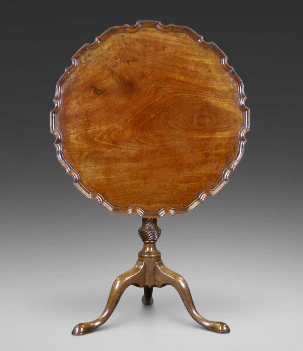 A George III pie-crust tripod table