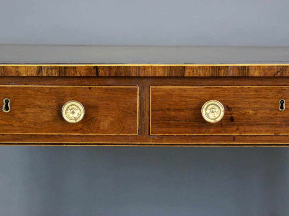 An unusual Regency rosewood writing table View VI
