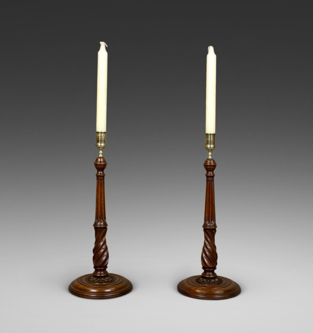 A exceptional pair of Georgian candlesticks