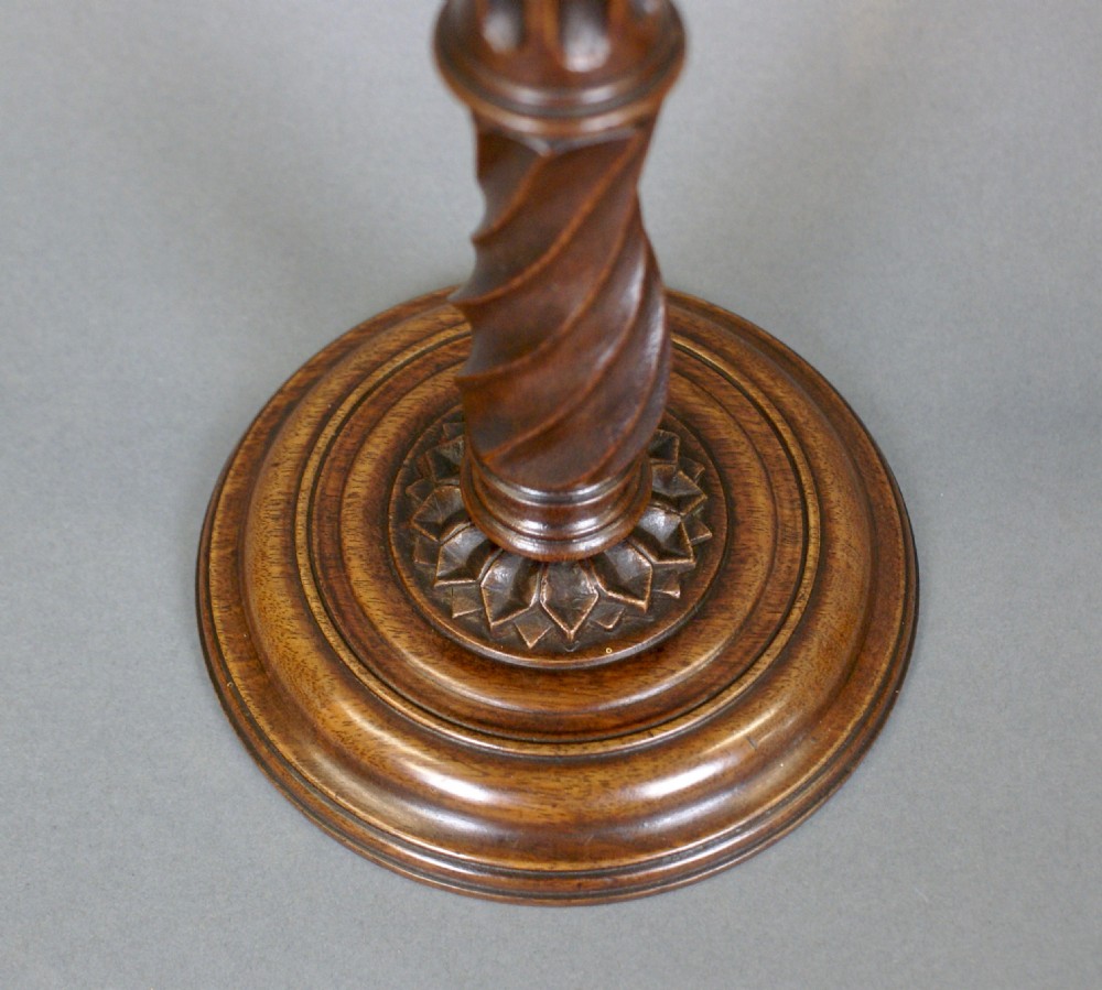 A exceptional pair of Georgian candlesticks View II