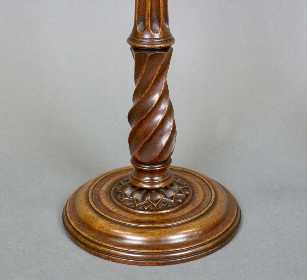A exceptional pair of Georgian candlesticks View III