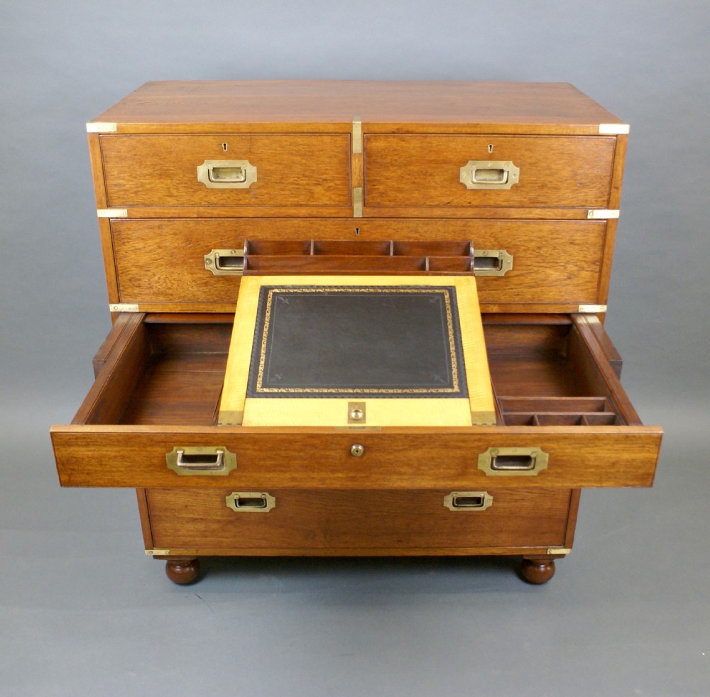 A solid teak secretaire military chest View VI