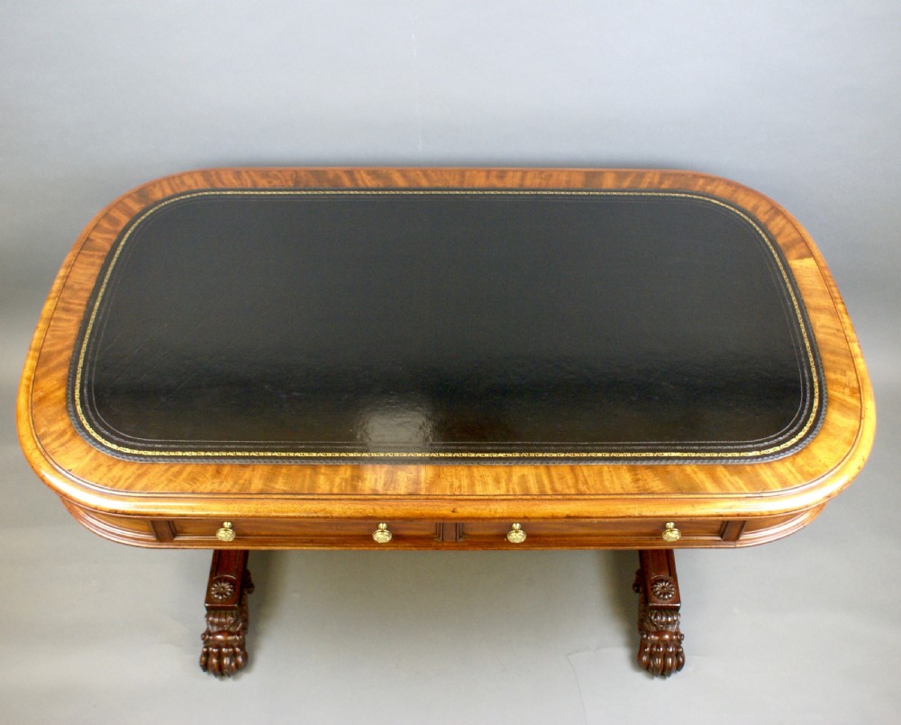 An imposing Regency mahogany library writing table View IV
