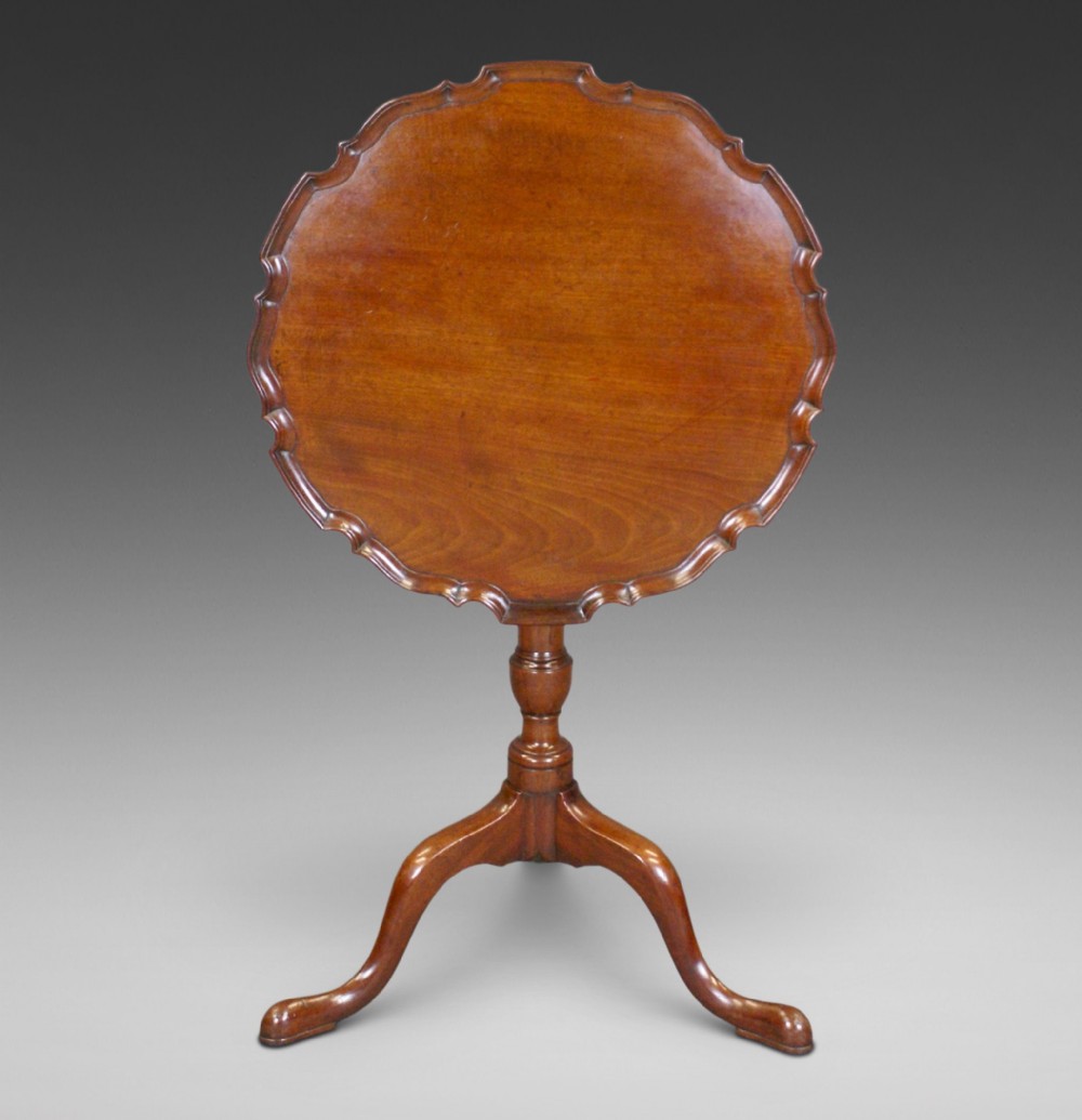 A George III mahogany piecrust tripod table