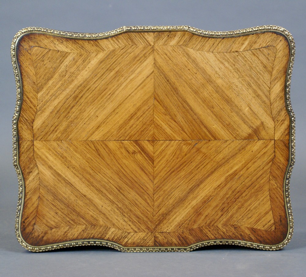 A French tulipwood and ormolu table View II