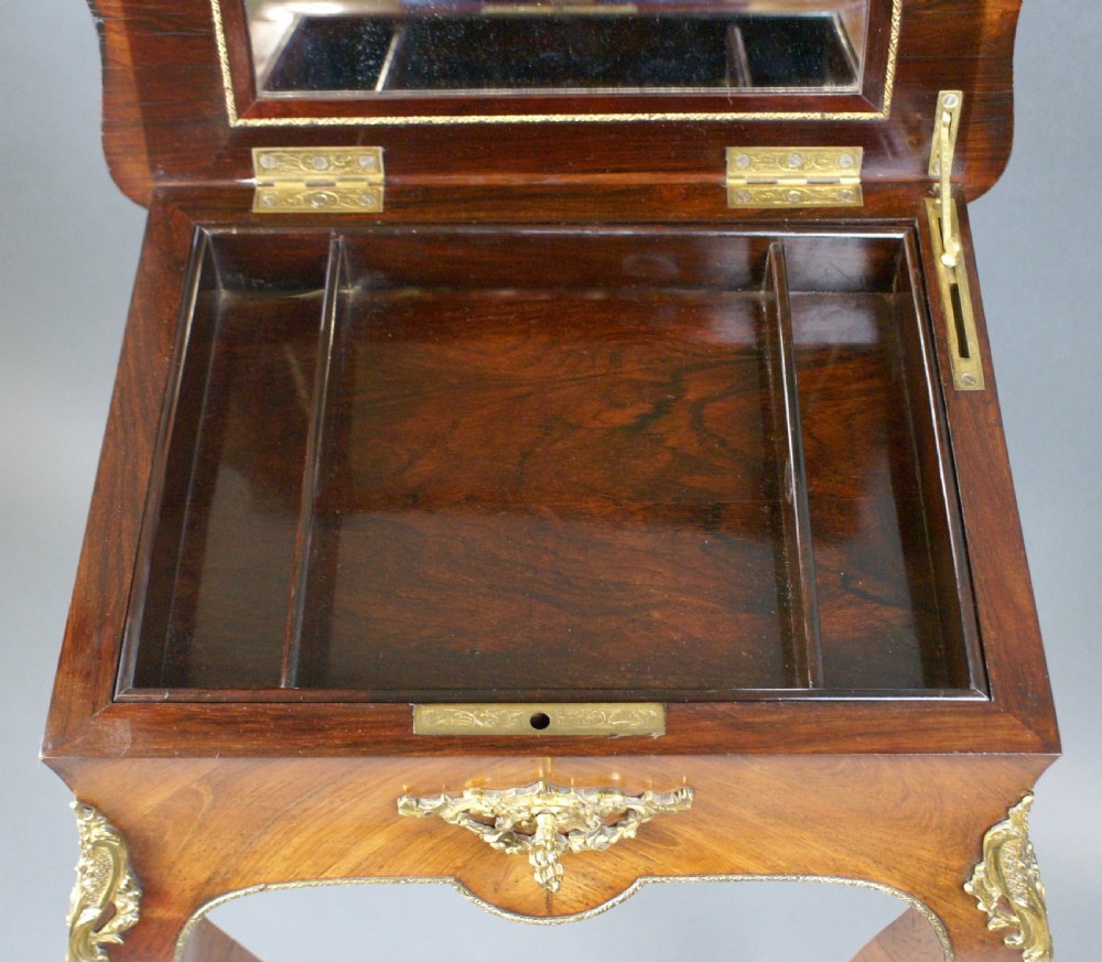 A French tulipwood and ormolu table View VI