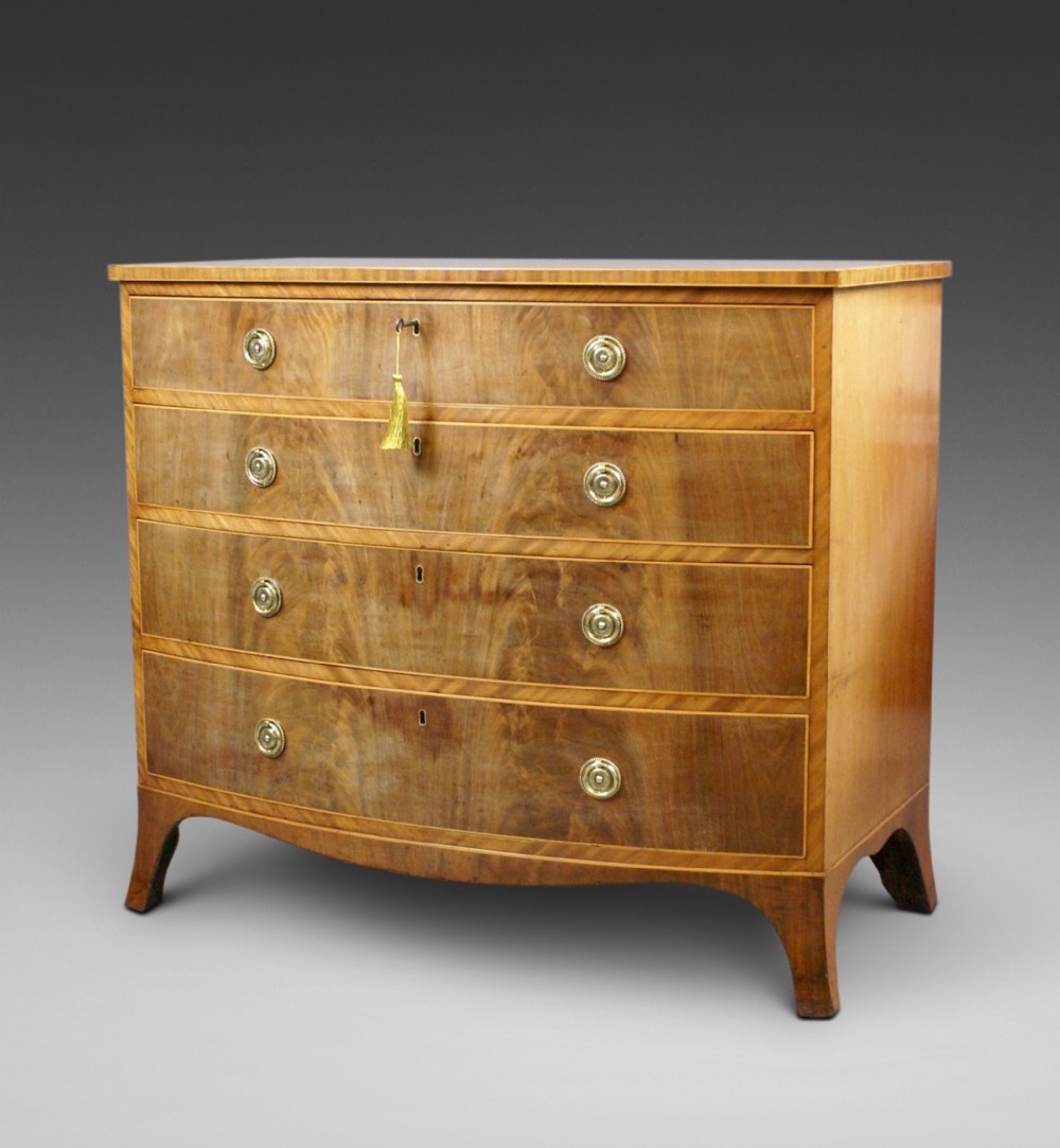 A George III Flame Mahogany Bow Fronted Chest