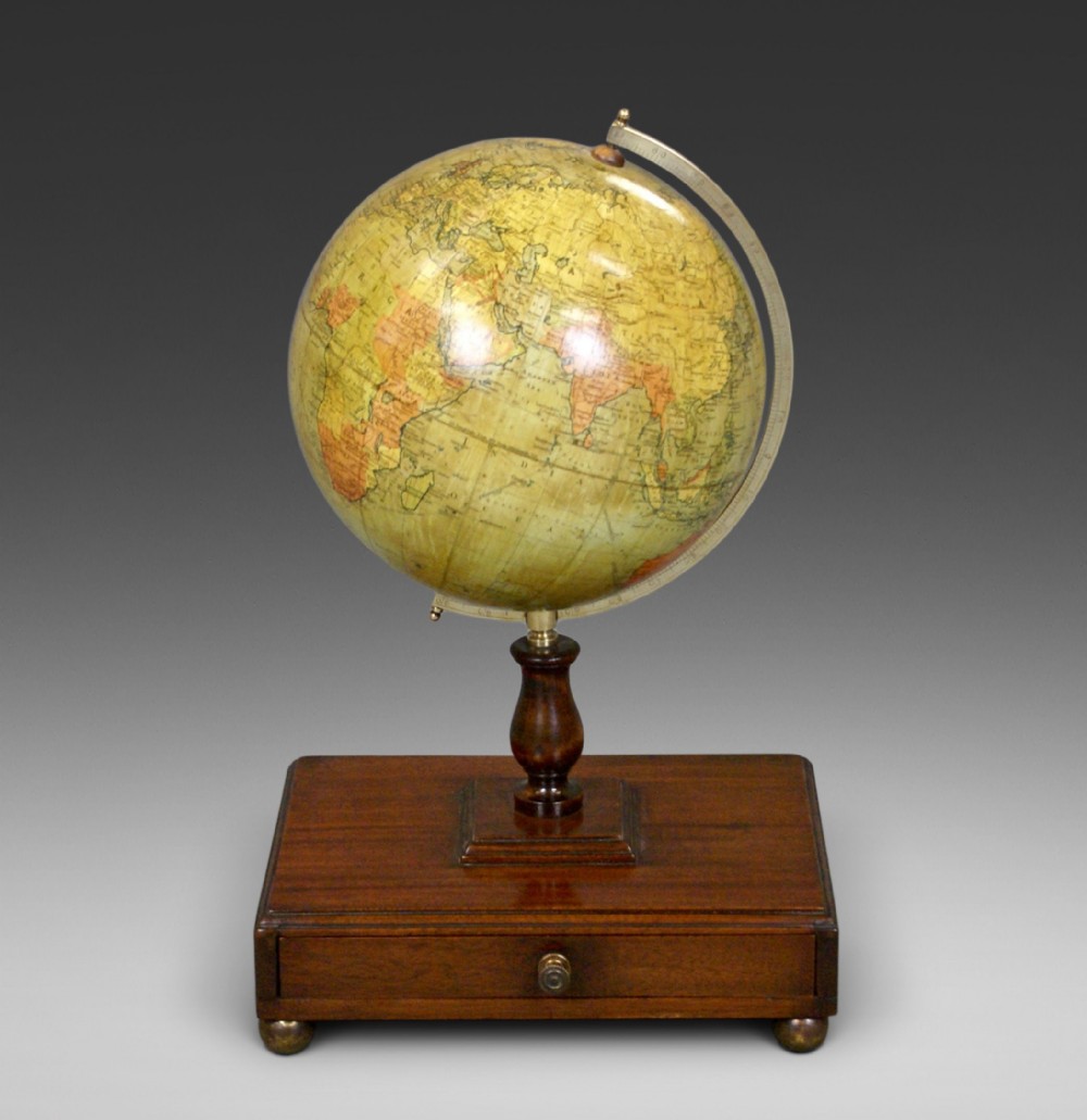  A Terrestrial Globe & Accompanying Atlas