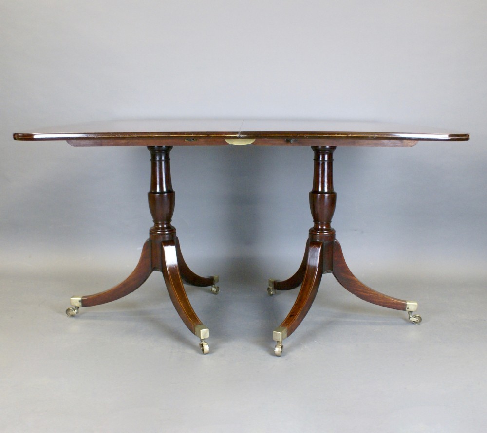 A Georgian Mahogany Twin Pillar Dining Table View VI