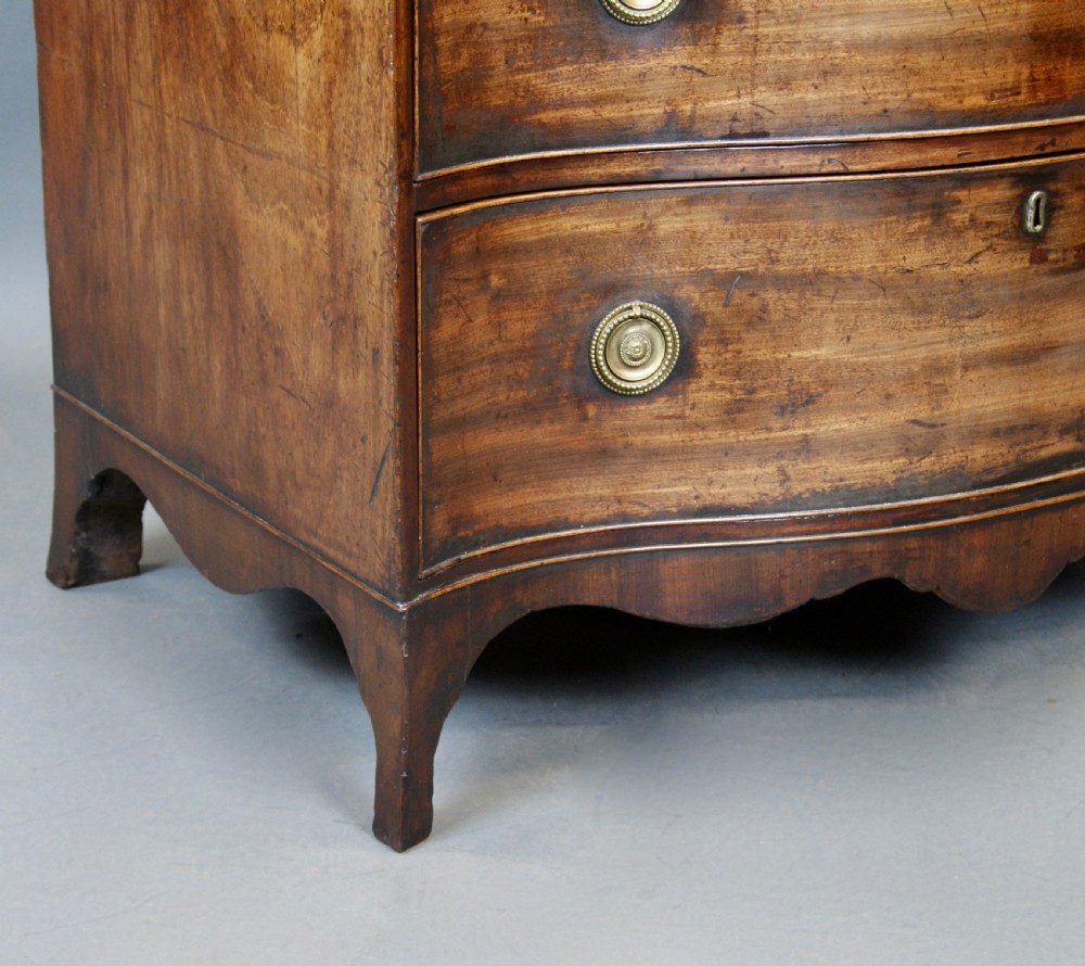 A Hepplewhite Period Mahogany Serpentine Chest  View VI