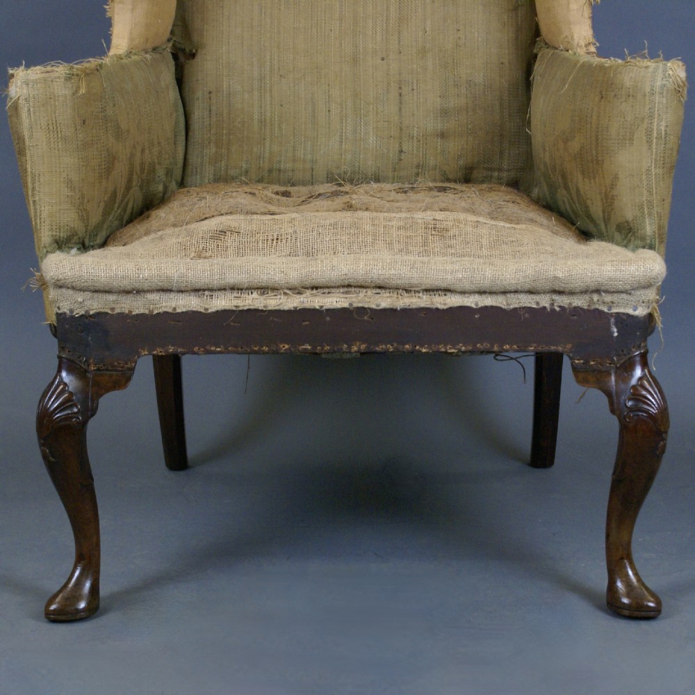 A 19Th Century Walnut Wing Chair View V