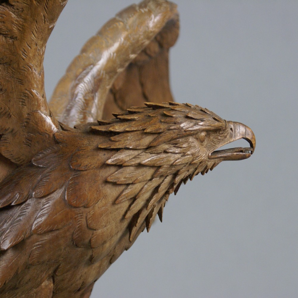 A Swiss 'Black Forest' Carved Linden Wood Eagle  View II