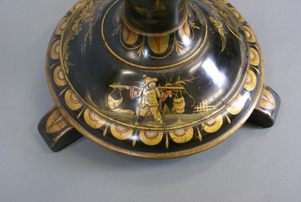 A tall black lacquered standard lamp featuring painted gold and red floral motifs on a turned column and circular base. View IV