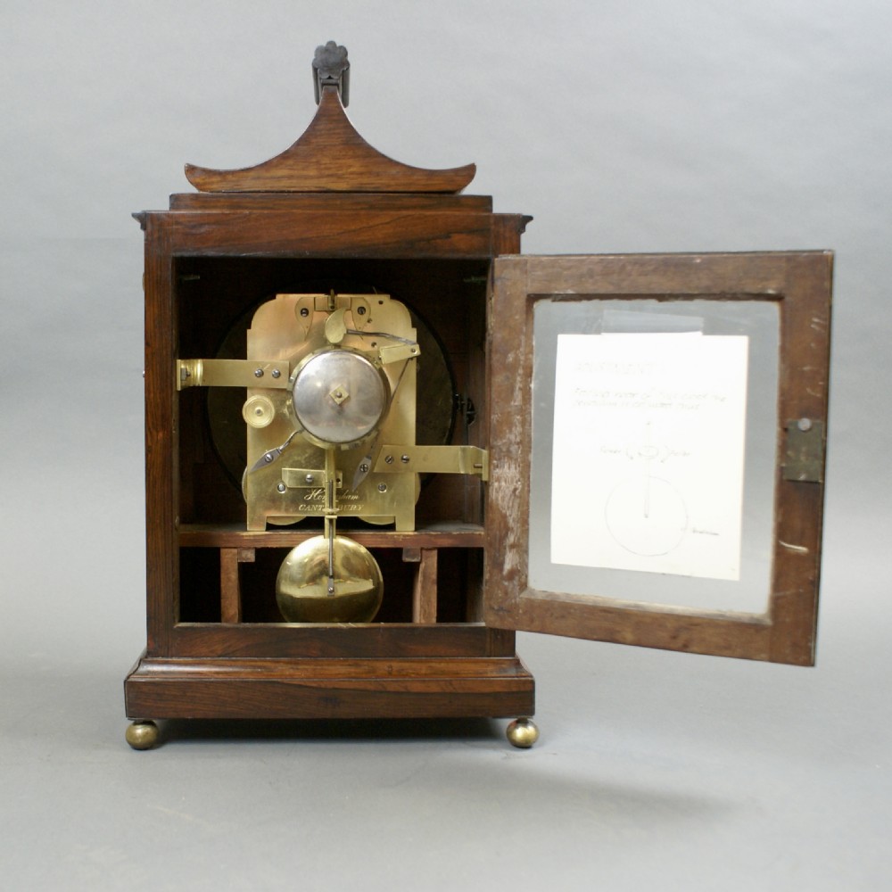 A Regency rosewood & brass inlaid bracket clock View V