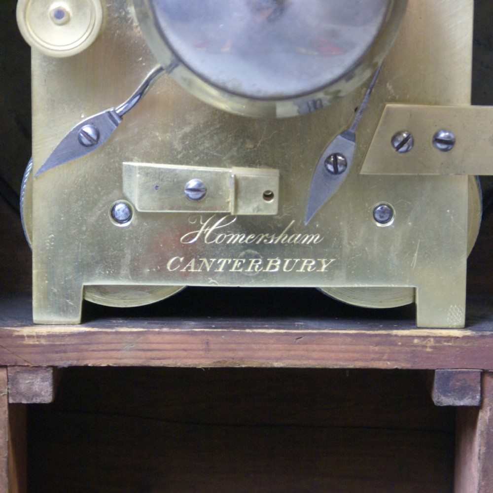 A Regency rosewood & brass inlaid bracket clock View VI