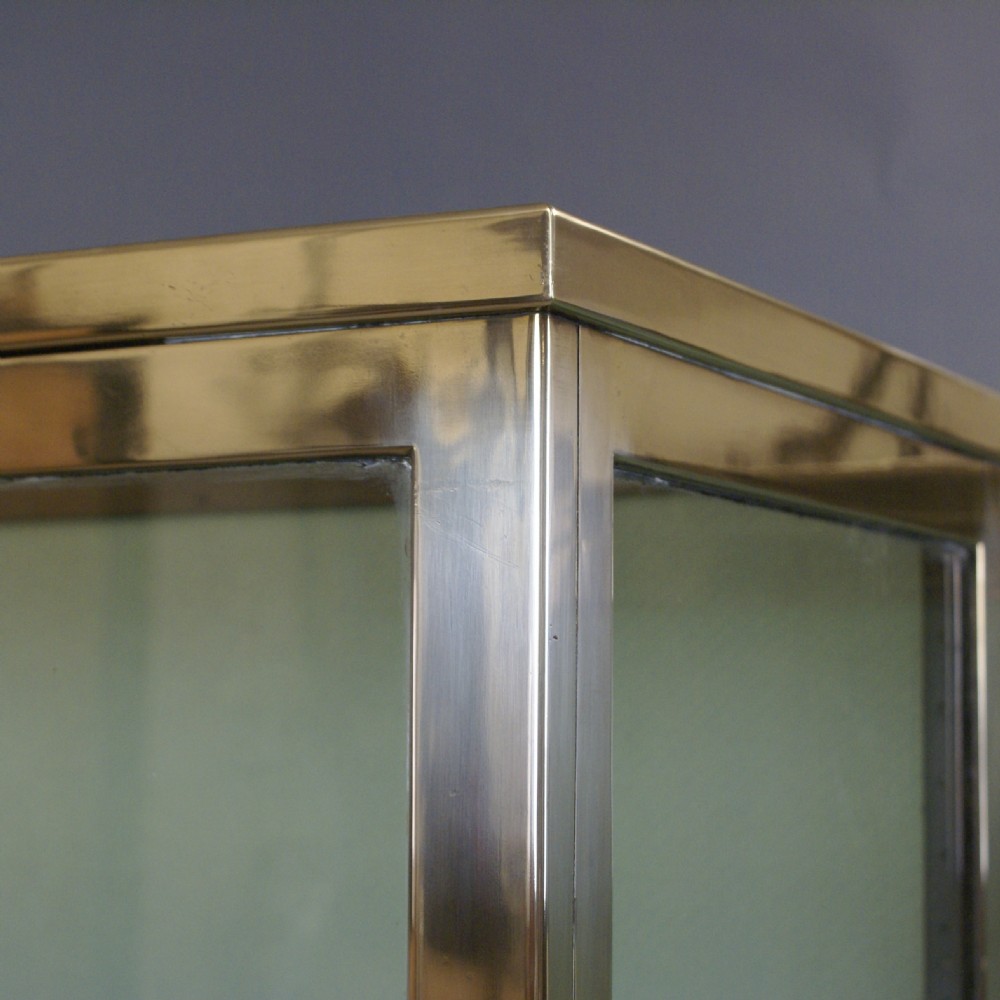 A Superb Pair Of 1920'S Brass Shop Display Cabinets. View III