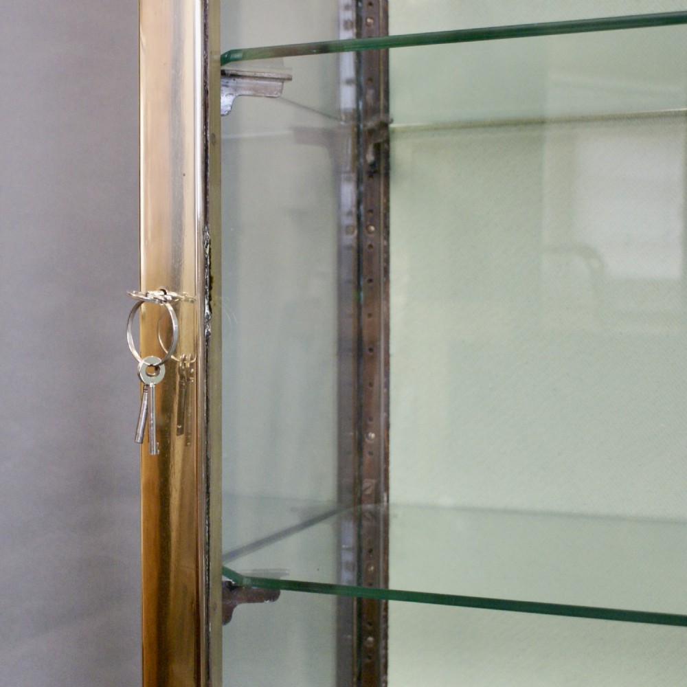 A Superb Pair Of 1920'S Brass Shop Display Cabinets. View VI