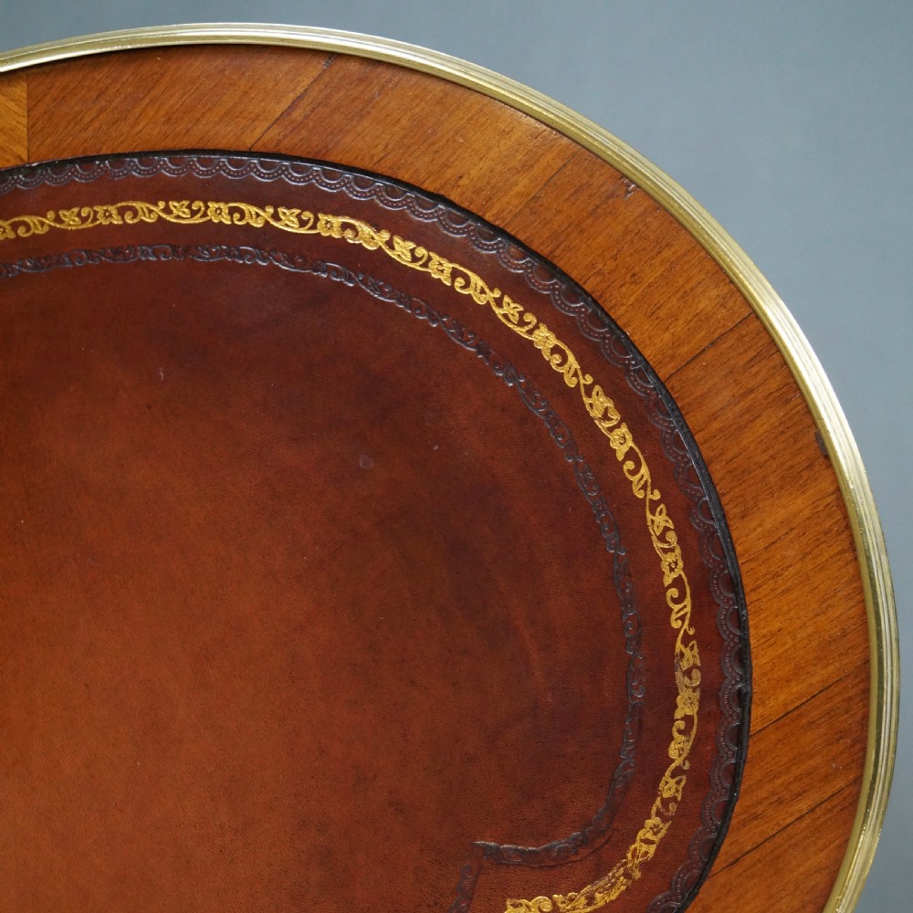 A French Louis XV style kidney-shaped writing desk featuring a brown leather top, parquetry veneer, gilded mounts, and cabriole legs. View VIII