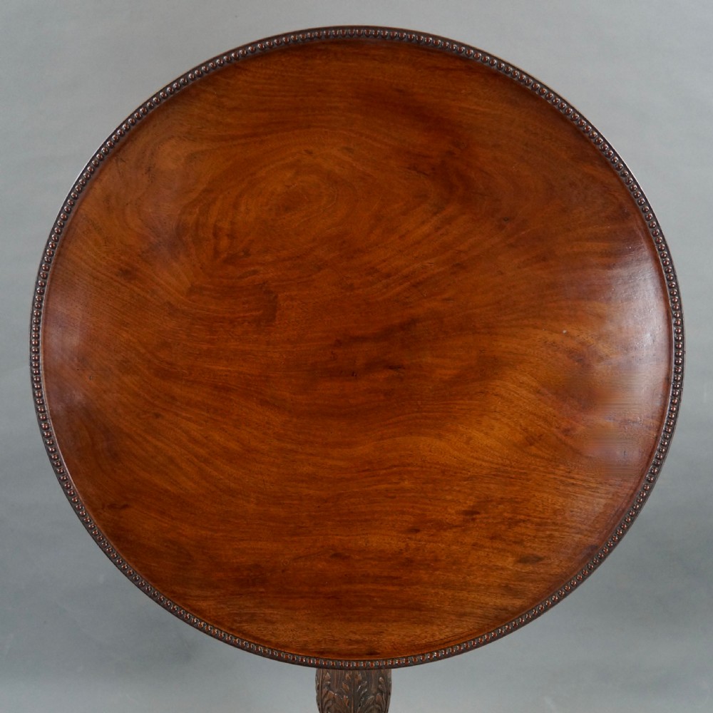 A Fine George III Carved Tripod Table View II