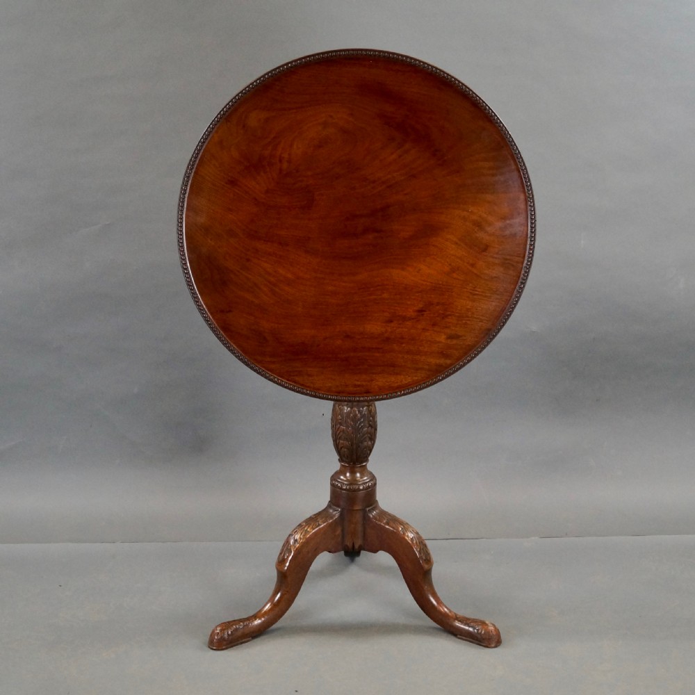 A Fine George III Carved Tripod Table View V