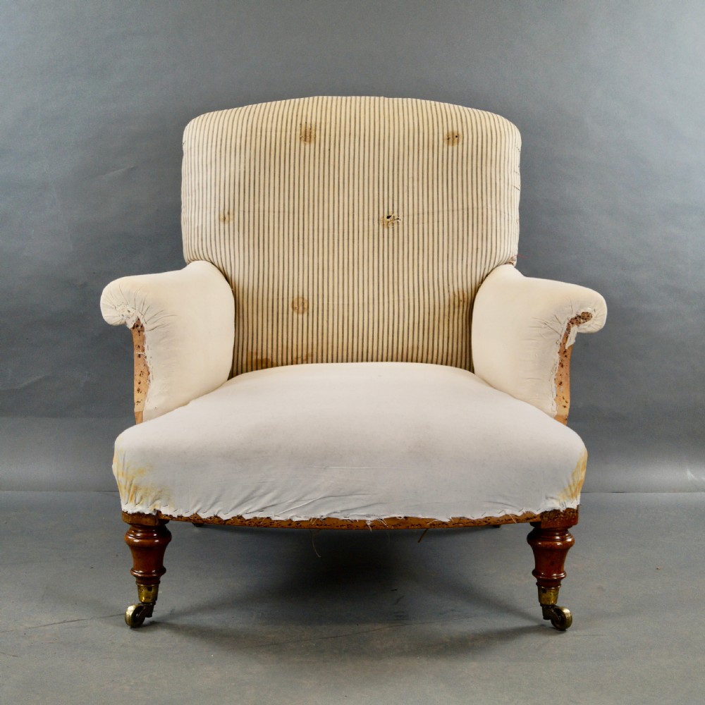 A Fine Walnut Arm Chair by Howard & Sons View II