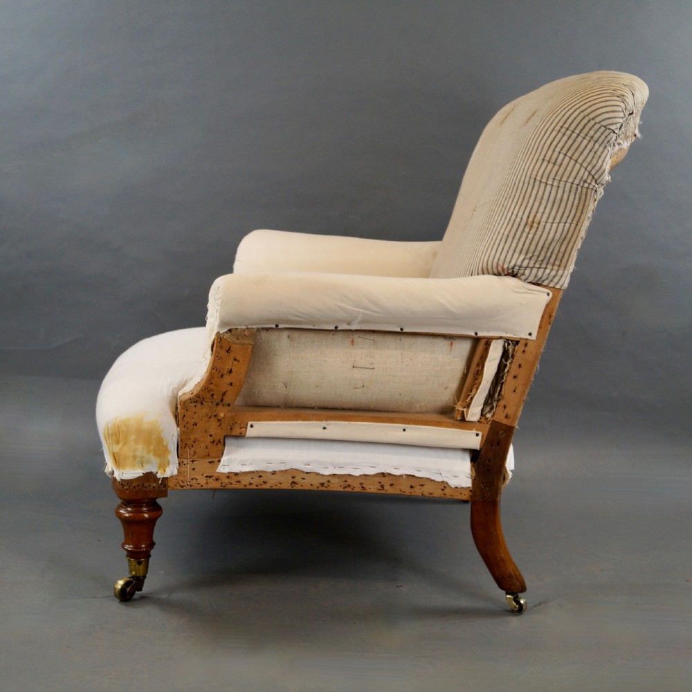 A Fine Walnut Arm Chair by Howard & Sons View V