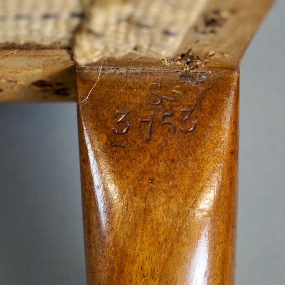 A Fine Walnut Arm Chair by Howard & Sons View VI