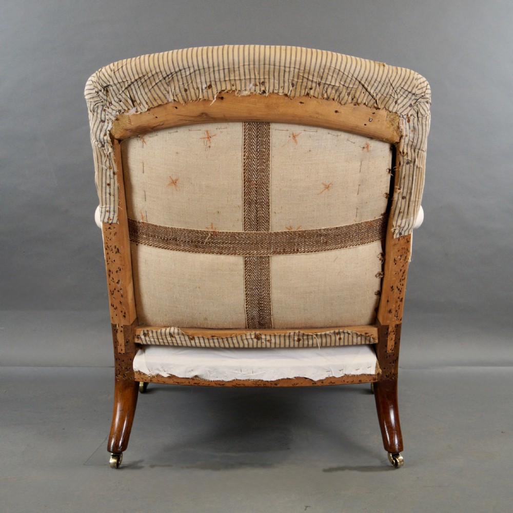 A Fine Walnut Arm Chair by Howard & Sons View VII