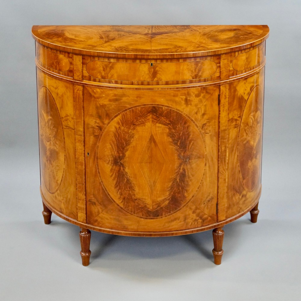 A Fine Pair Of Satinwood Demi Lune Commodes View II