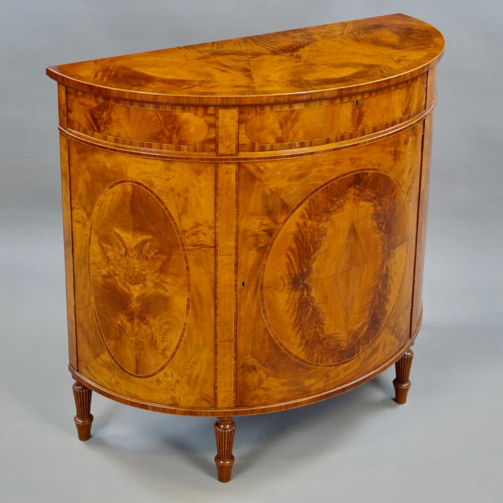 A Fine Pair Of Satinwood Demi Lune Commodes View III