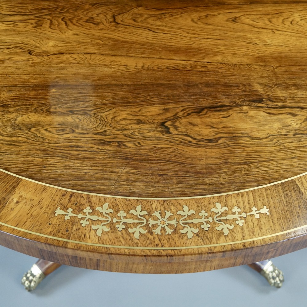 A very attractive Regency rosewood & brass inlaid centre table.  View III