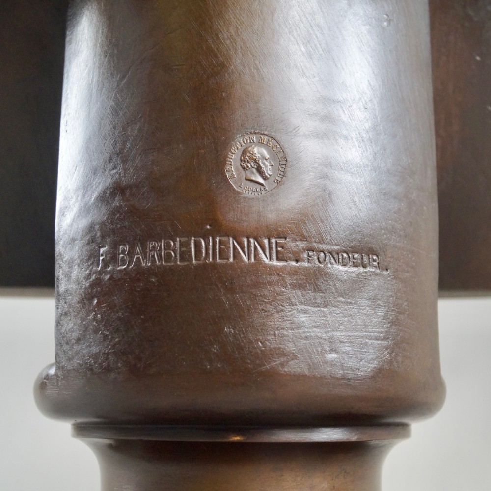 A large dark patinated bronze bust depicting Jesus Christ wearing the Crown of Thorns, mounted on a turned pedestal. View VII