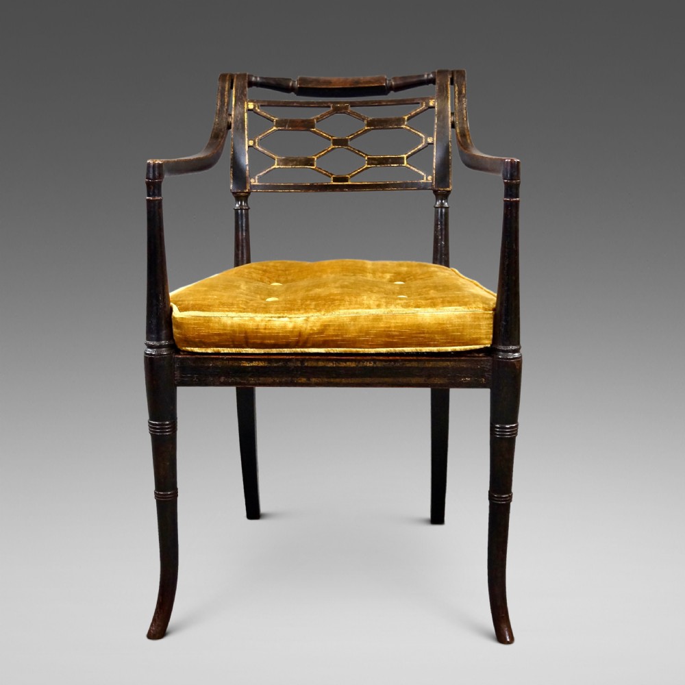 A Fine Regency Ebonised & Gilt Decorated Arm Chair