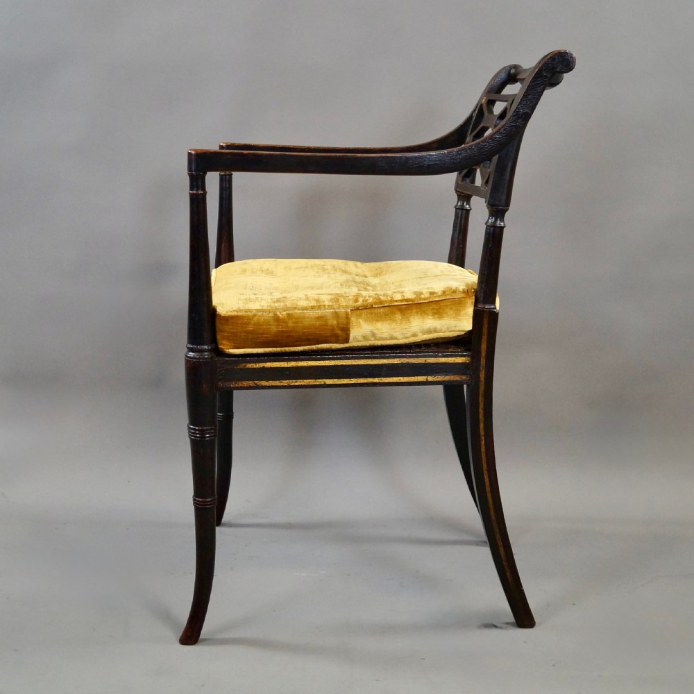 A Fine Regency Ebonised & Gilt Decorated Arm Chair View II