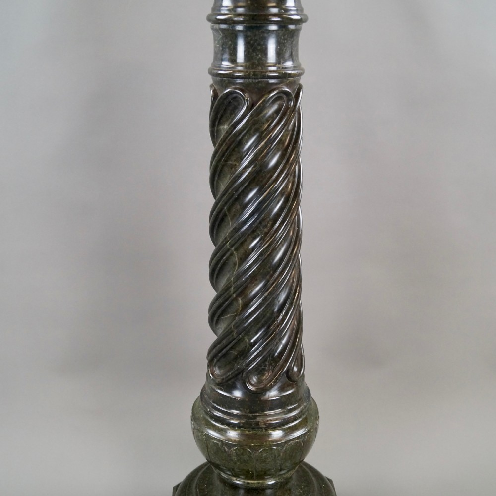 A mid-nineteenth-century French dark green Verde Antico marble column with a carved barley twist shaft and octagonal base. View III