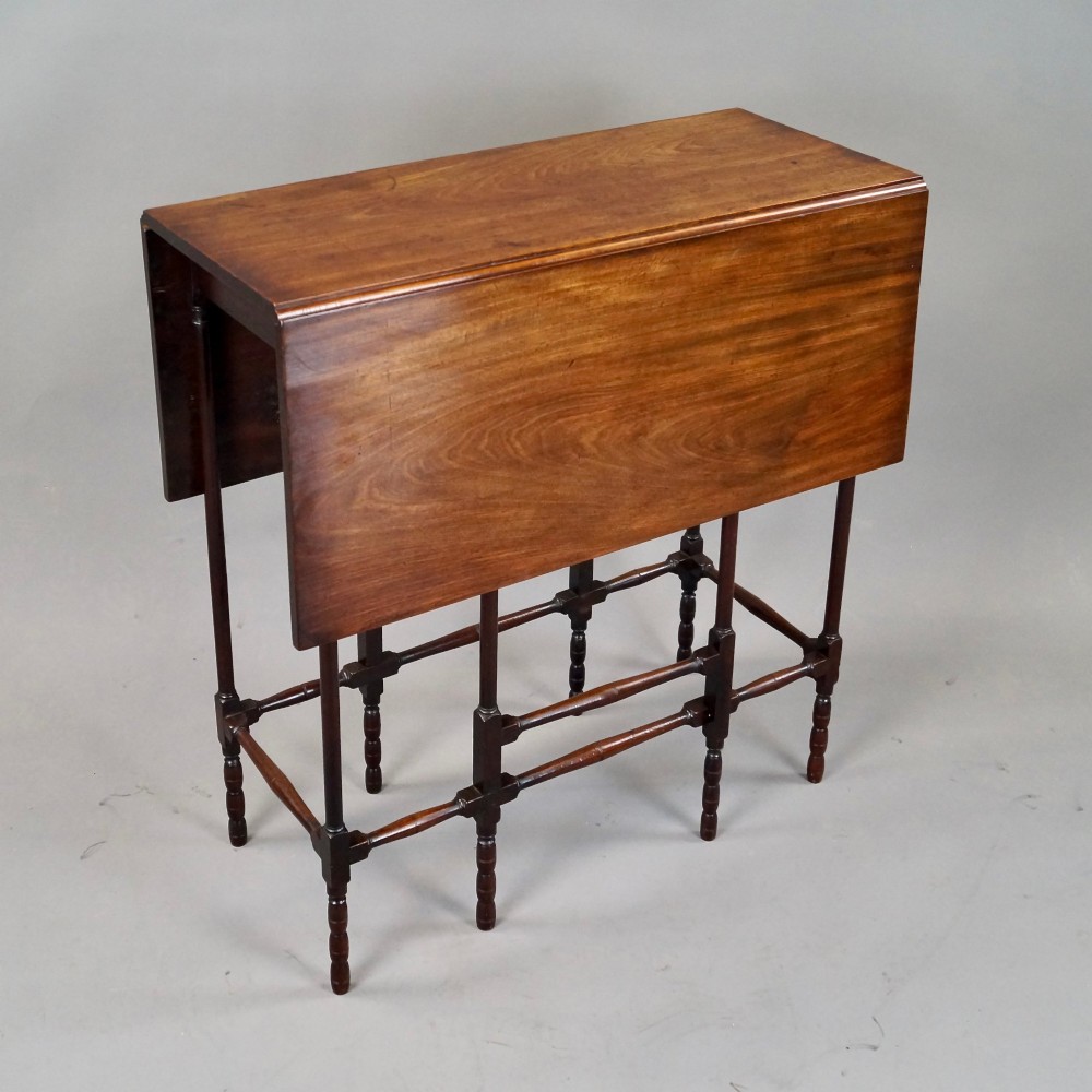 An 18th-century Georgian mahogany spider leg table with two drop leaves supported by slender turned wooden gate legs. View V