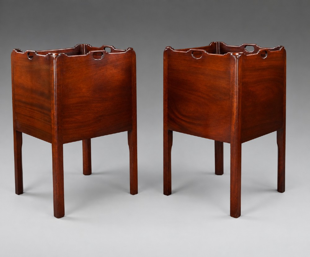 A pair of Georgian style mahogany bedside cupboards featuring top gallery trays with cut-out handles, slatted tambour doors, single lower drawers with brass handles, and square legs. View III