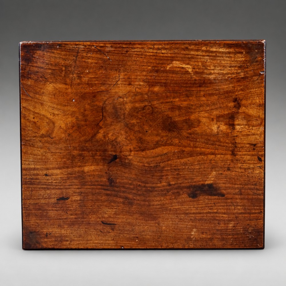 A rectangular George III mahogany side table featuring four straight tapered square legs and a polished wooden surface. View II