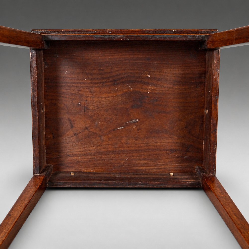 A rectangular George III mahogany side table featuring four straight tapered square legs and a polished wooden surface. View IV