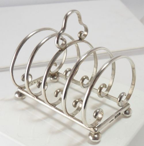 DISTINCTLY PRETTY SILVER TOAST RACK SHEFFIELD 1915 - ADDITIONAL PHOTO 1