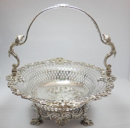 a magnificent chinoiserie george ii swing handled basket hallmarked london 1757 by samuel herbert and co - CATEGORY: ANTIQUE SILVER - DATED 18TH CENTURY