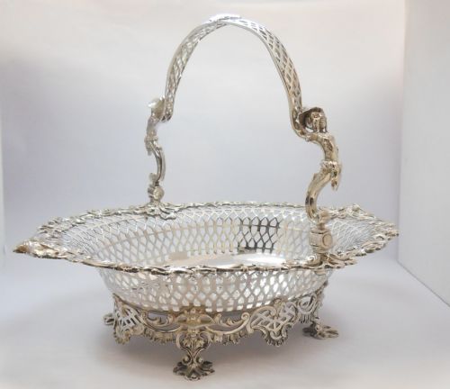 A MAGNIFICENT CHINOISERIE GEORGE II SWING HANDLED BASKET HALLMARKED LONDON 1757 BY SAMUEL HERBERT AND CO - ADDITIONAL PHOTO 1