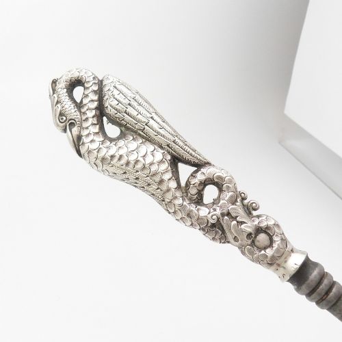 VICTORIAN SILVER HANDLED BUTTON HOOK WITH WINGED CREATURE