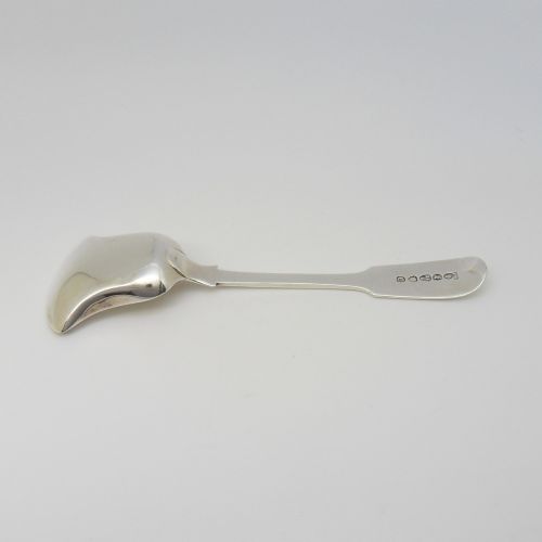 An early Victorian sterling silver sugar shovel with a shaped rectangular shovel bowl and an engraved monogram on the flat handle. View VI