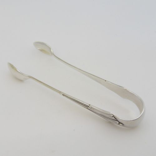 A pair of Victorian sterling silver sugar tongs in the Albany pattern with spoon-shaped ends and visible hallmarks. View III