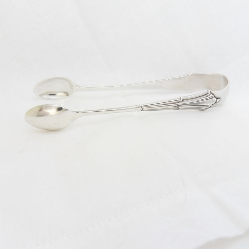 A pair of Victorian sterling silver sugar tongs in the Albany pattern with spoon-shaped ends and visible hallmarks. View V