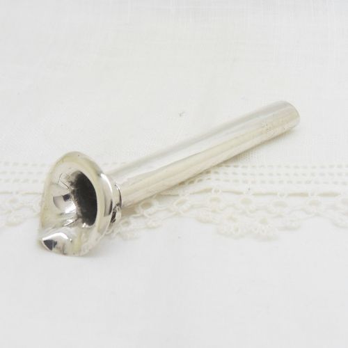 An Edwardian sterling silver cylindrical posy holder featuring a flared rim and a small attachment loop. View V